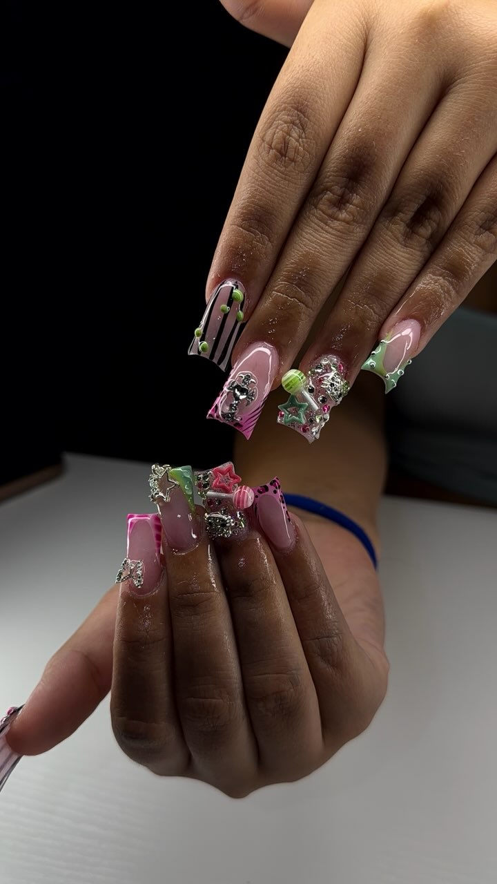 Hand-painted nail set by Clawz By Juliee